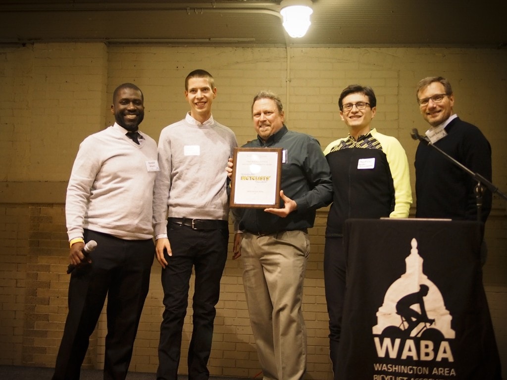Accepting the award was Phil Koopmen, Co-Owner of BicycleSPACE, and BicycleSPACE staff. 
