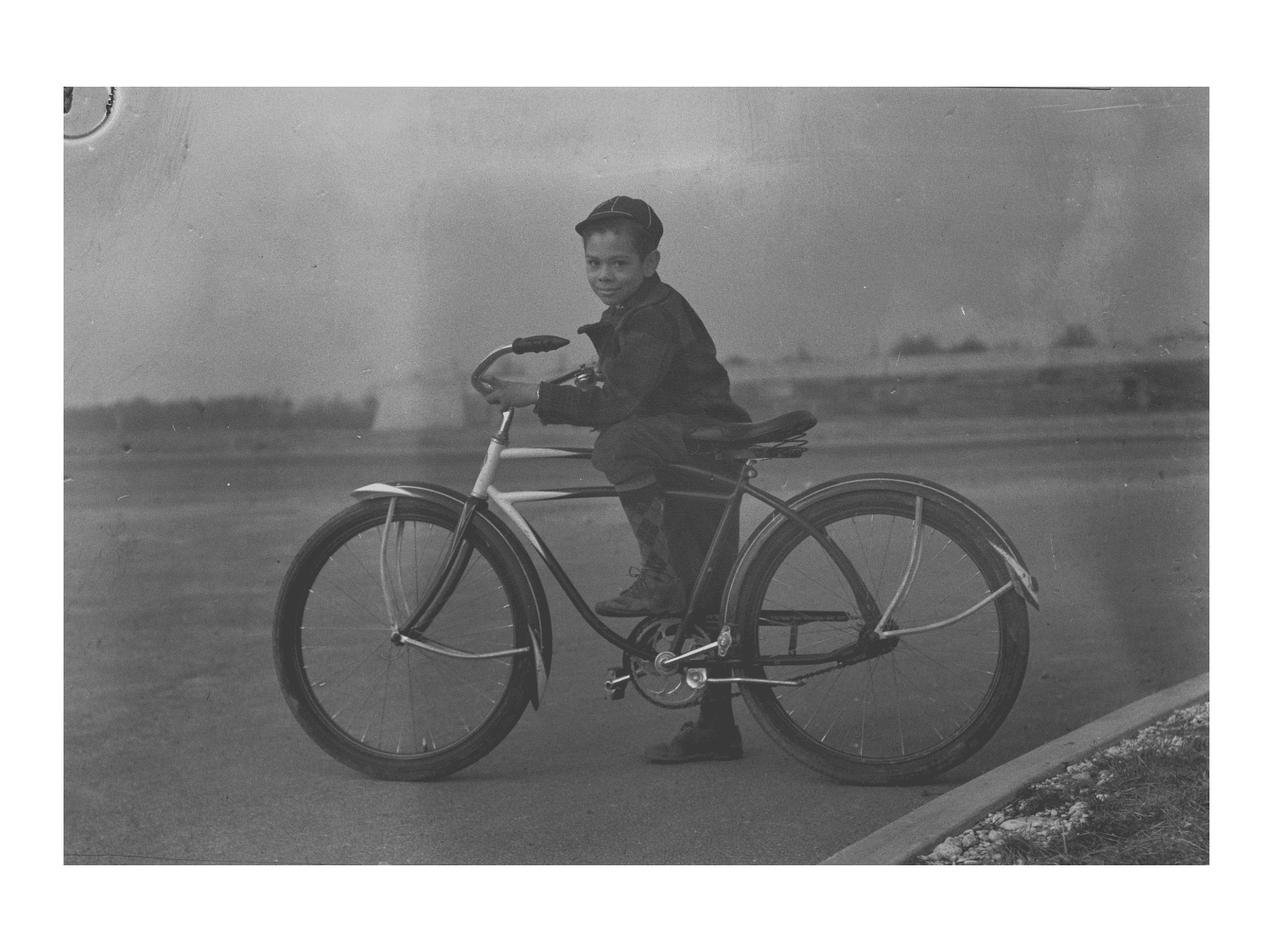 Jack Jackson poses on his bike, in profile.