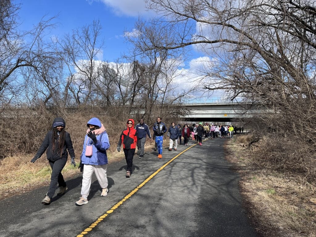 Participants at The Hike Crew's Hike Through History event in February 2024 on the Anacostia River Trail.