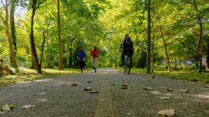 Runners and a bicyclist on the Marvin Gaye Trail